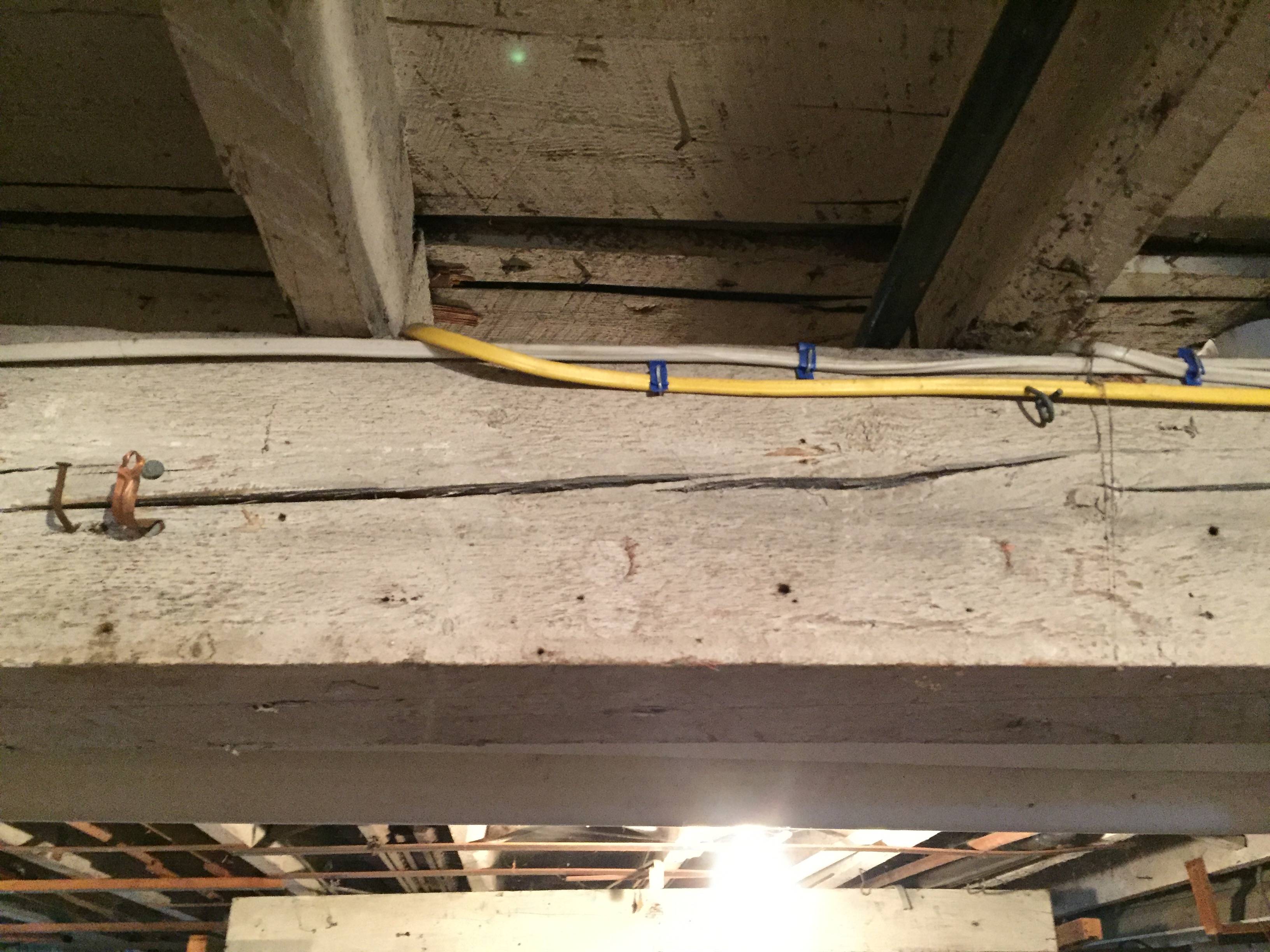 Cracked or sagging basement support beam