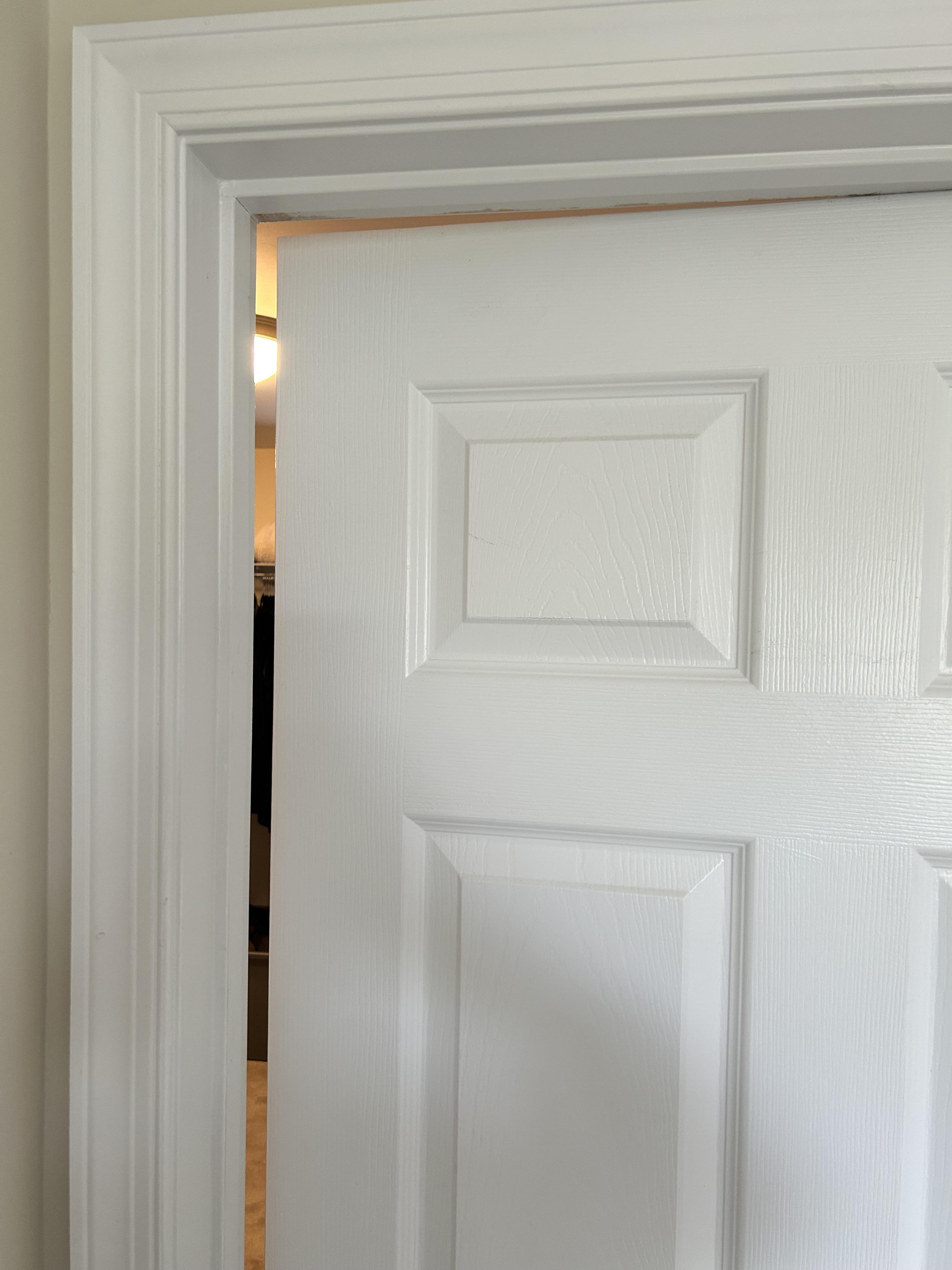 Interior door that will not close due to structural shifting