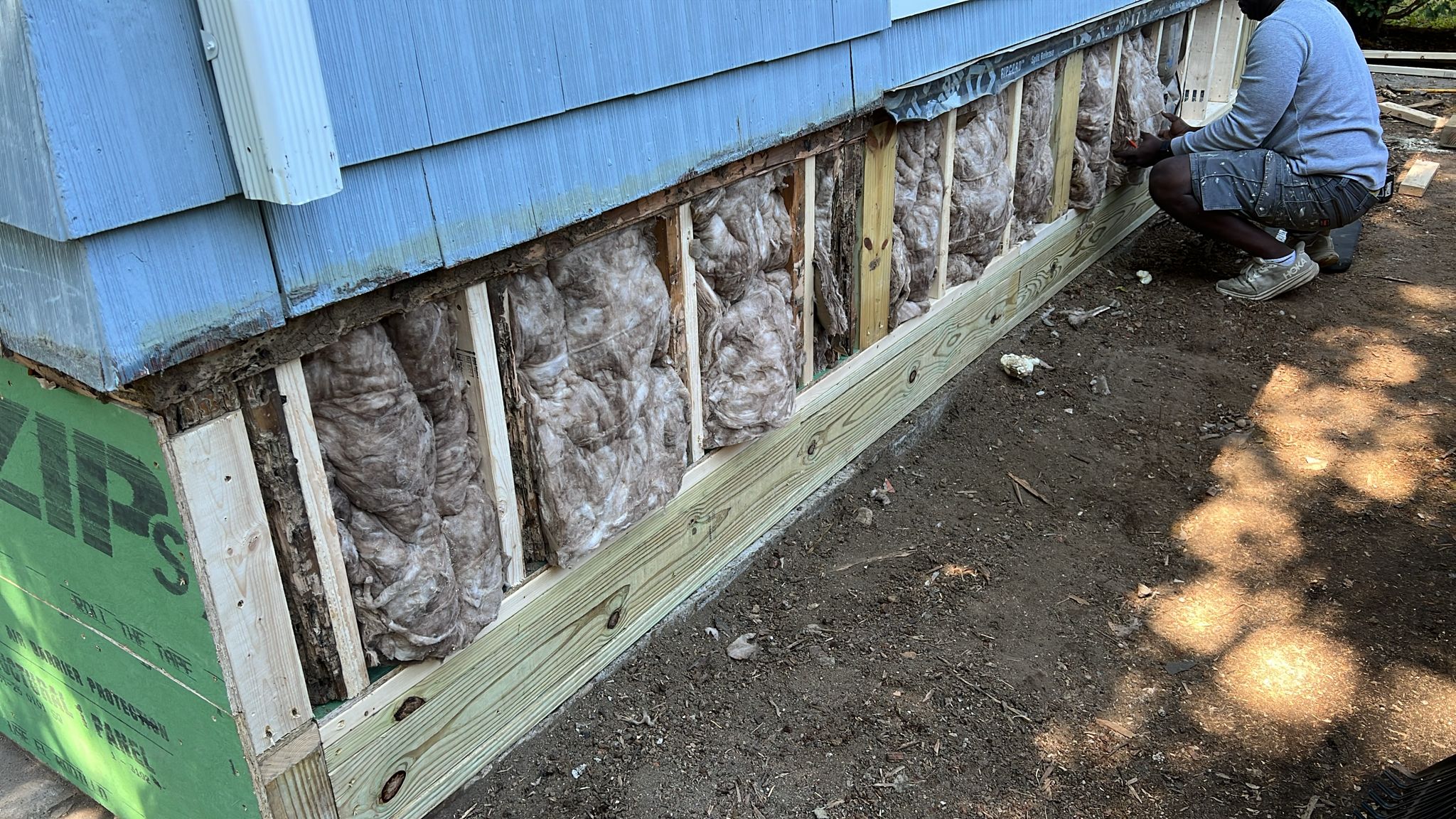 Drying fans running in a water damaged room