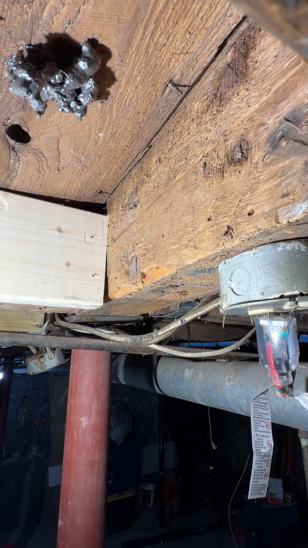 Steel lally column supporting a Worcester beam